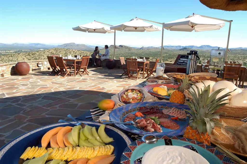 Breakfast spread overlooking the Namibian landscape at GocheGanas