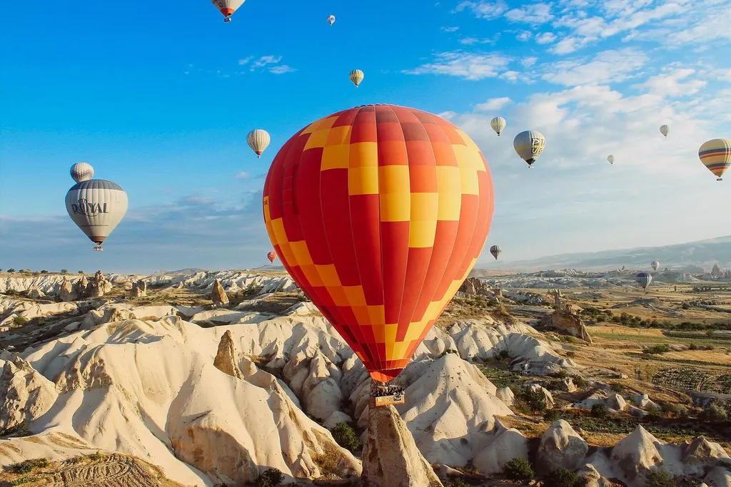 Hot-air balloon above a desert landscape