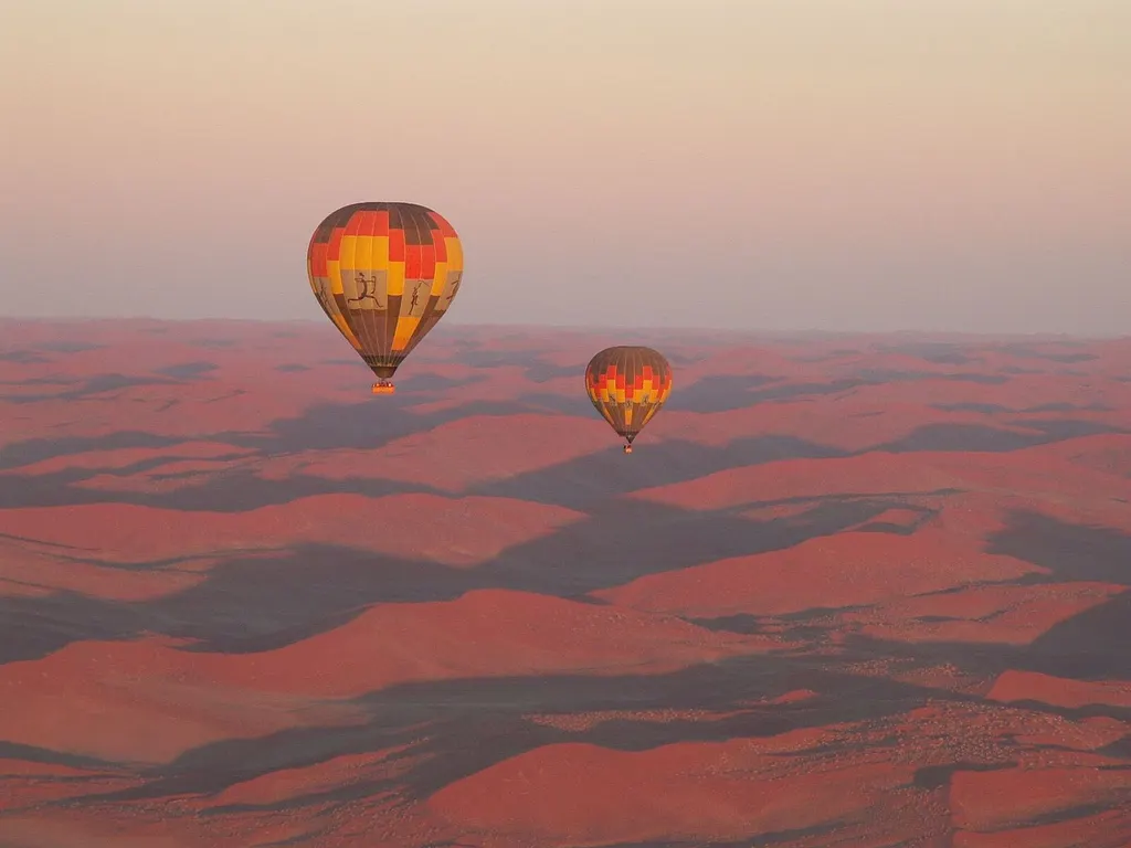 Hot-air balloon above a desert landscape
