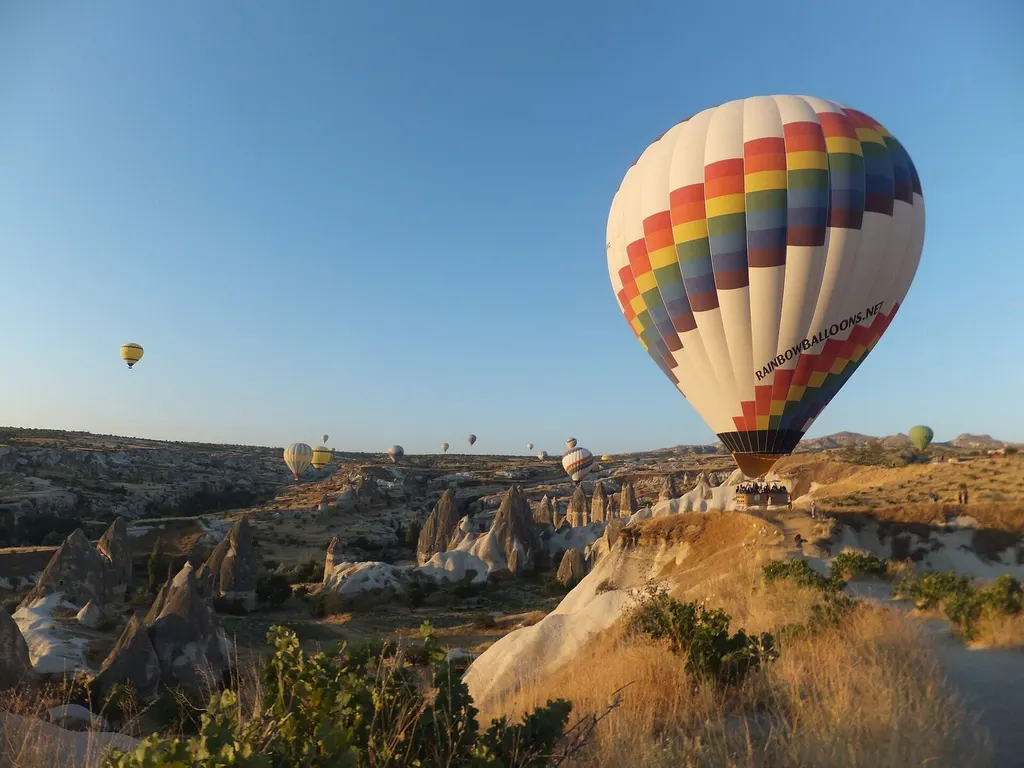 Hot-air balloon above a desert landscape