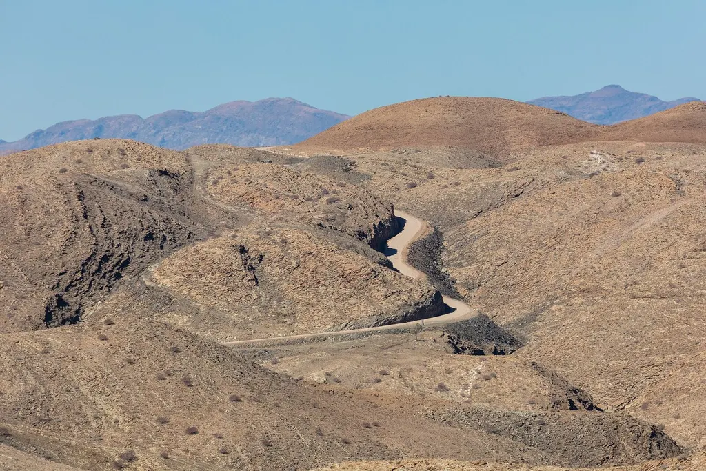 Elevated view across the dunes and open landscape of the Namib Desert