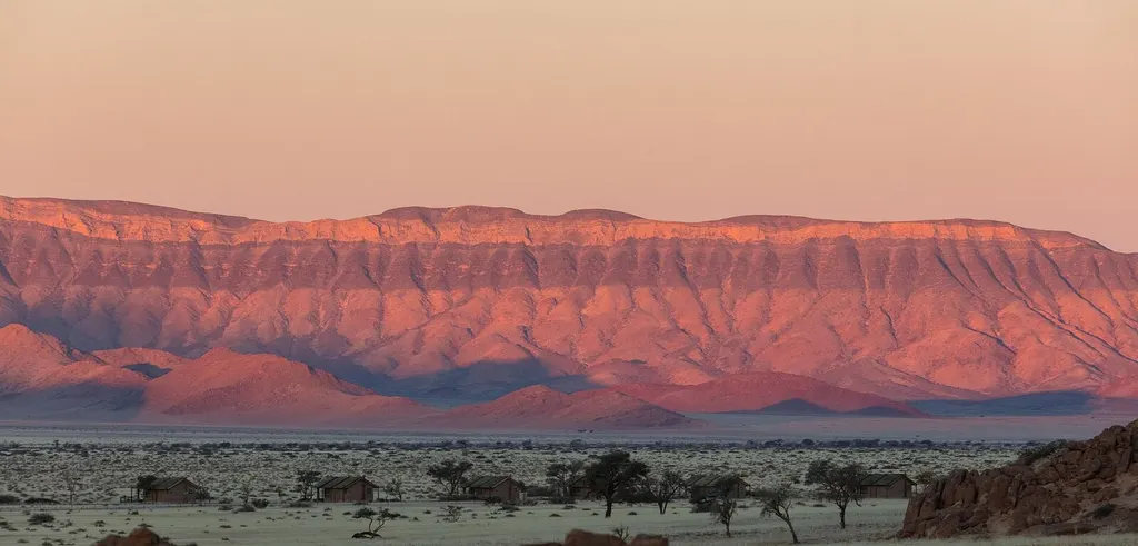 Elevated view across the dunes and open landscape of the Namib Desert